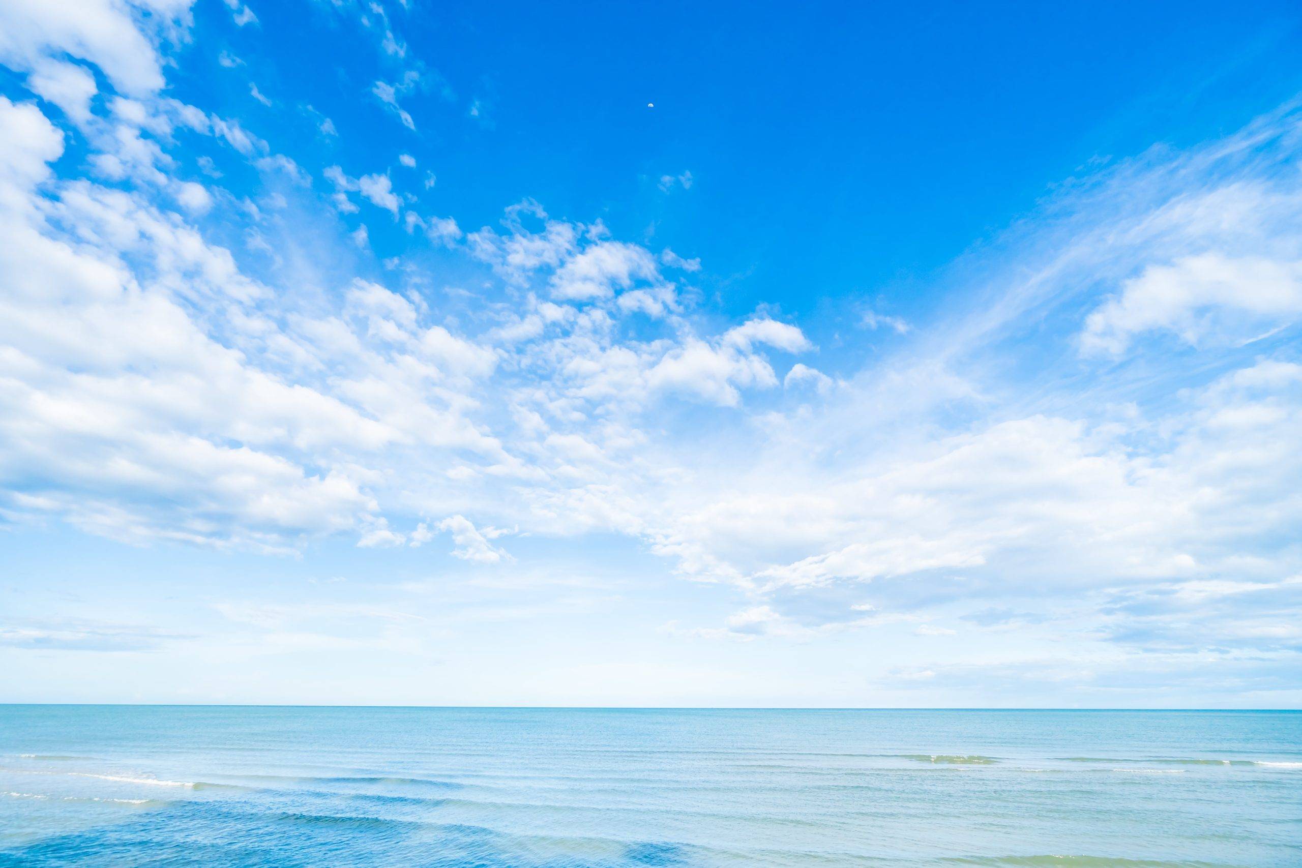 white-cloud-blue-sky-sea-min-scaled.jpeg